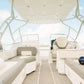 Cushioned deck seating and shade canopy aboard Keelooma's private speedboat Kandooma, El Nido island hopping tour