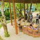 Guests in sombreros being briefed by Keelooma guides in the bamboo pavilion at Kaseledan Farm, with the jeepney waiting behind, El Nido, Palawan