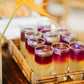 Welcome drinks of lemongrass, calamansi and blue ternate, grown at Kaseledan Farm, served in tall glasses on a bamboo tray, El Nido, Palawan